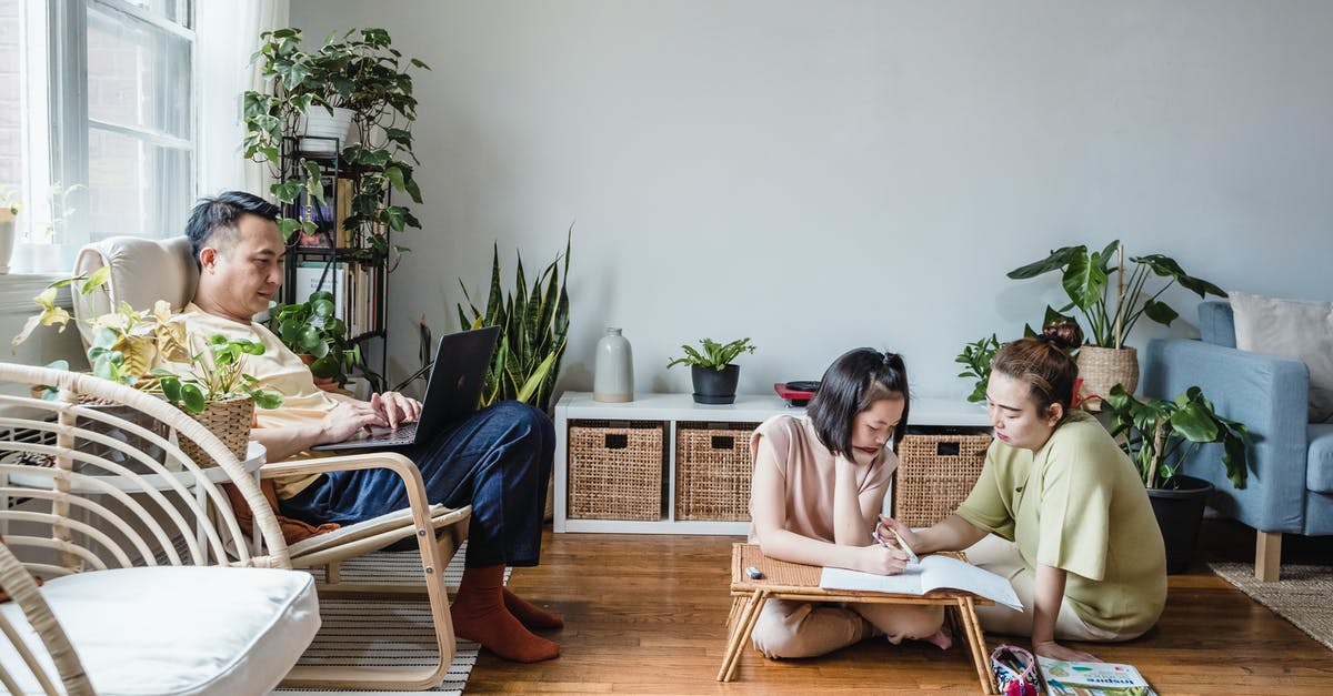 Applying for Two Student Visa [closed] - Woman in White Shirt Sitting on White Chair