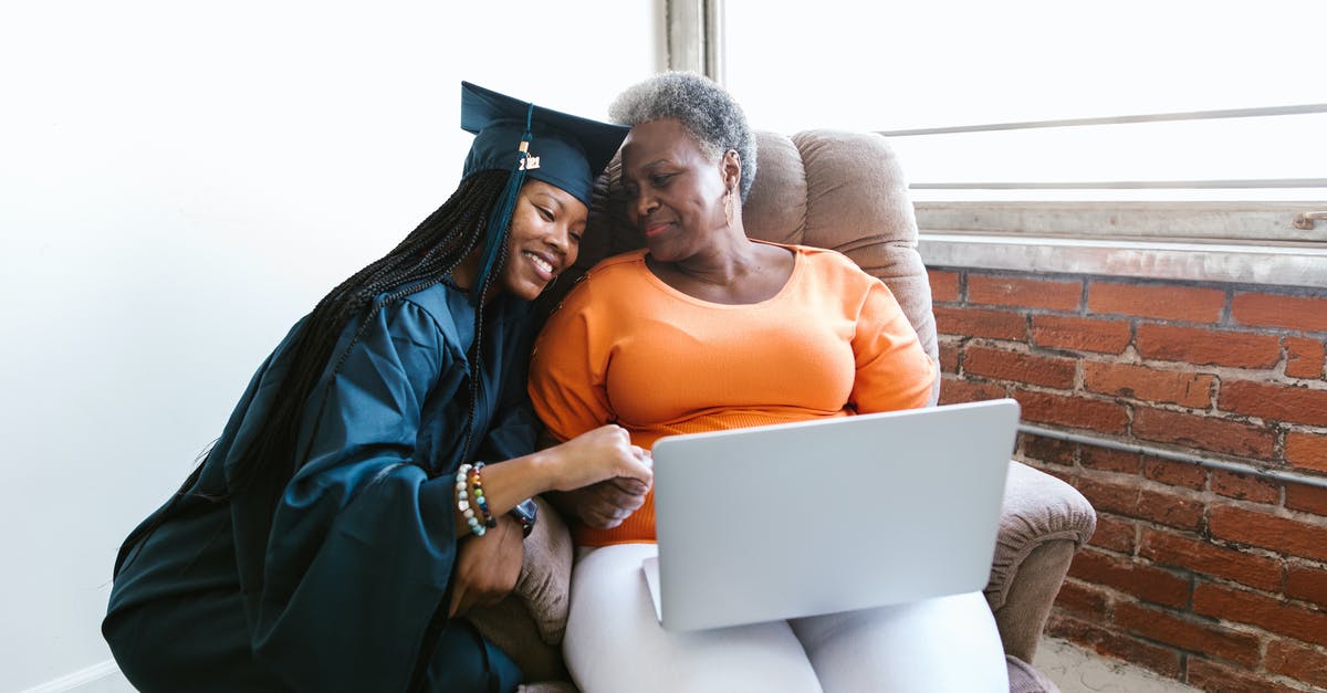 Applying for UK Visitor visa for daughter's graduation - A Woman in Graduation Dress Sitting Beside her Mother