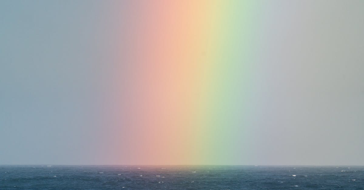 Applying for visa outside country of origin - Rainbow on sky over sea