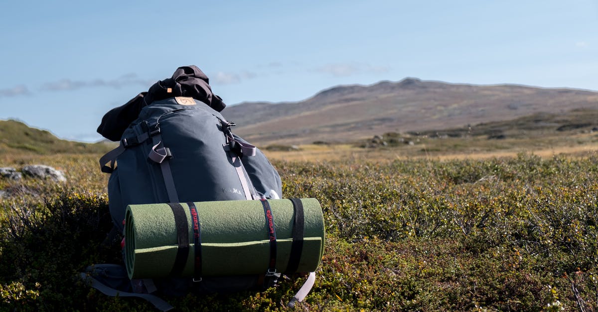 April Hokkaido Camping and Hiking [closed] - Big Backpack with Mat on a Grass Field