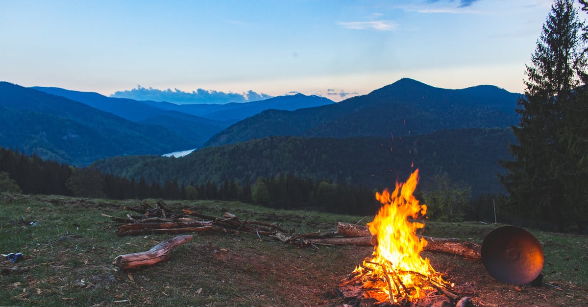 April Hokkaido Camping and Hiking [closed] - Bonfire Surrounded With Green Grass Field