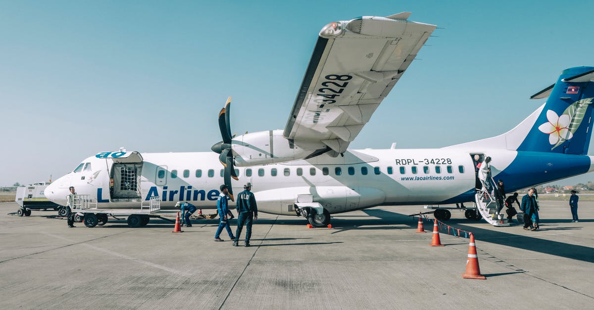 Are airlines legally obligated to feed passengers without charging? - People Getting Off the Airplane