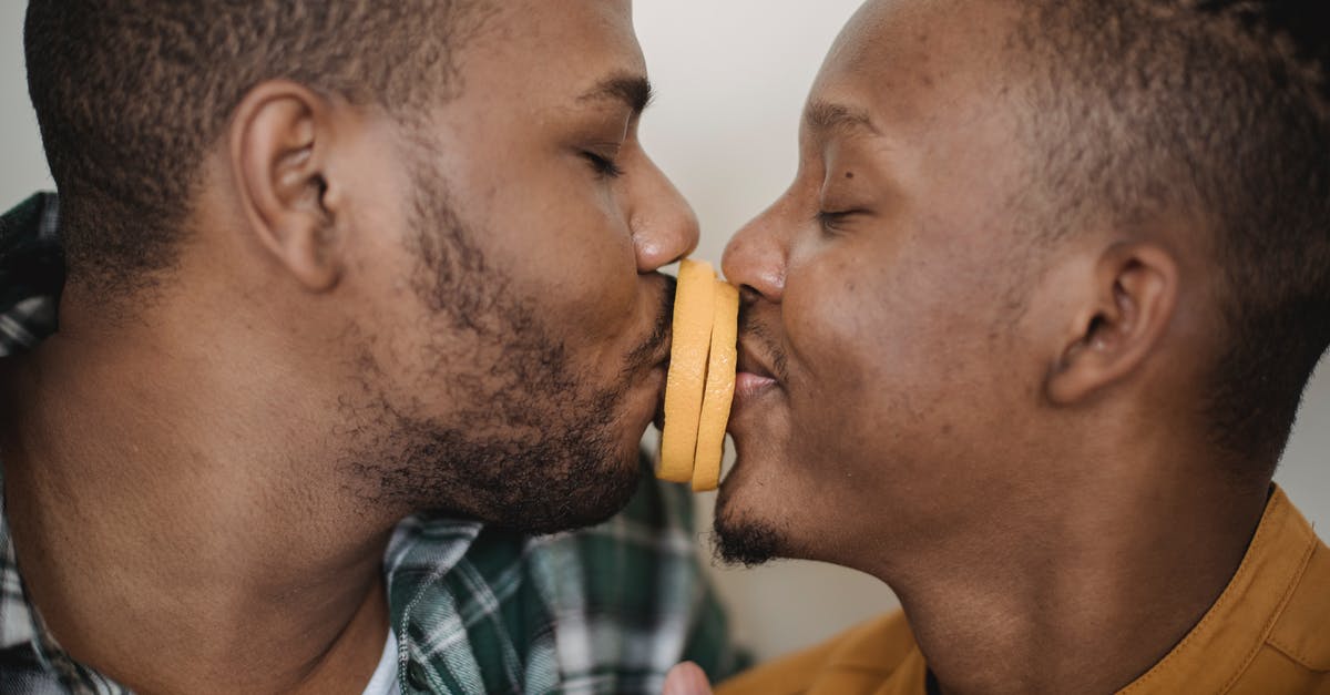 Are biometrics shared between GCC? [closed] - Two Men Kissing With Orange Slices Between Them