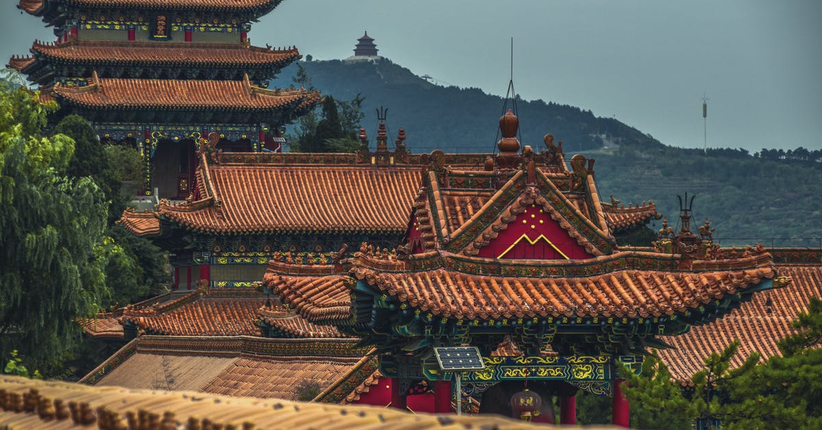 Are citizens of anywhere other than mainland China eligible to unfettered travel in Tibet? - Brown and Red Temple