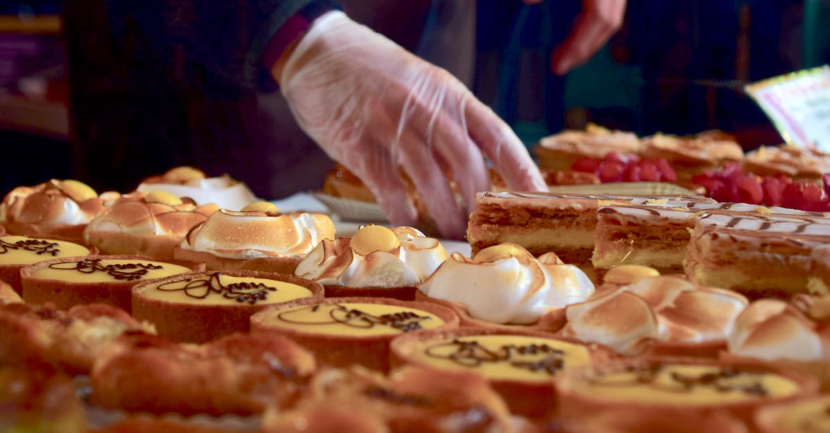 Are cream-filled pastries allowed in my carry-on? - Person Holding a Cupcake