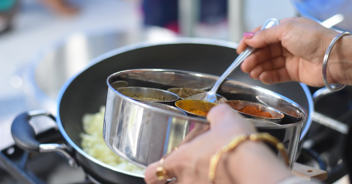 Are pans allowed in hand luggage? - A Woman Cooking Indian Food