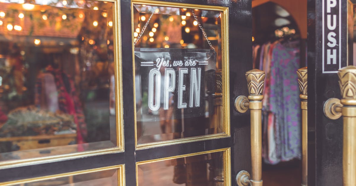 Are Parisian shops open on Sundays? - Closeup Photo Black Door Yes We Are Open Signage