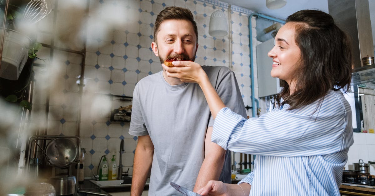 Are there actually any hostels in Macau? - Happy Couple Having Breakfast