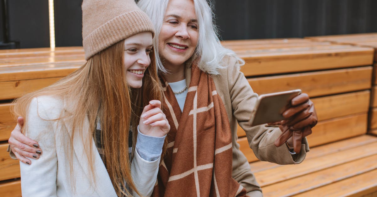 Are there age restrictions to stay in some hostels? - Grandmother and Teenager Taking a Selfie