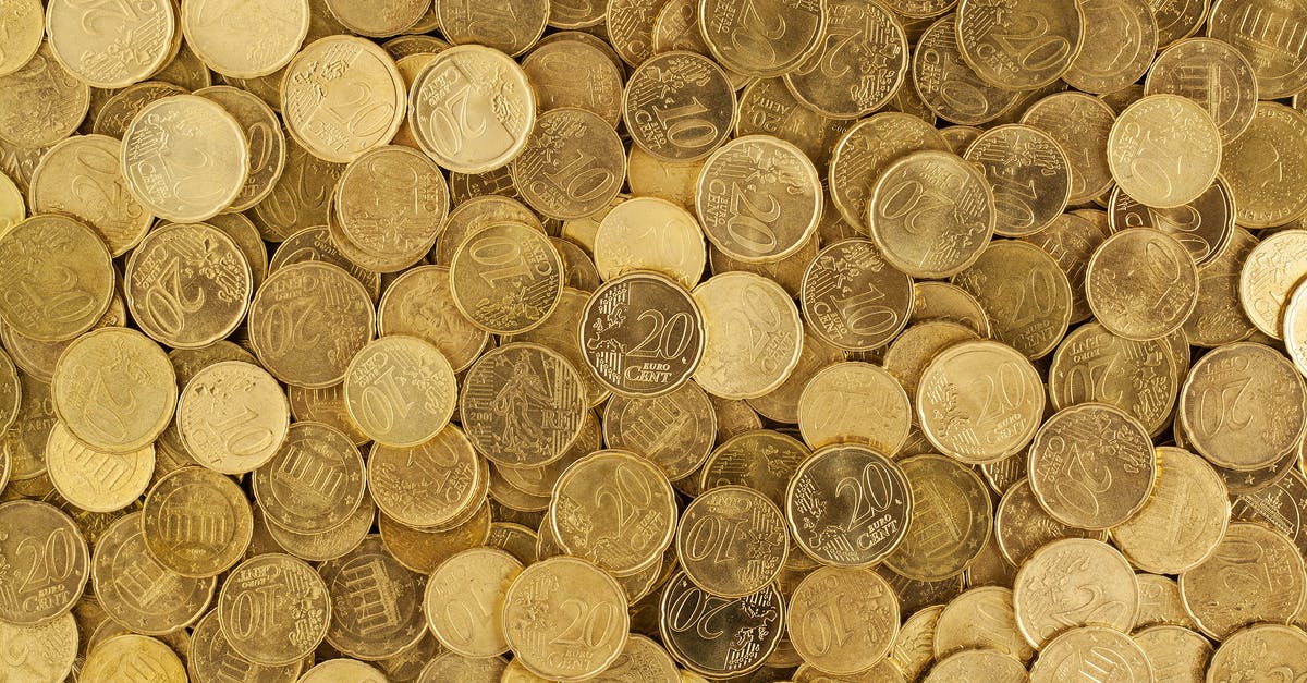Are there any ATM fees within the Euro zone? - Pile of Gold Round Coins