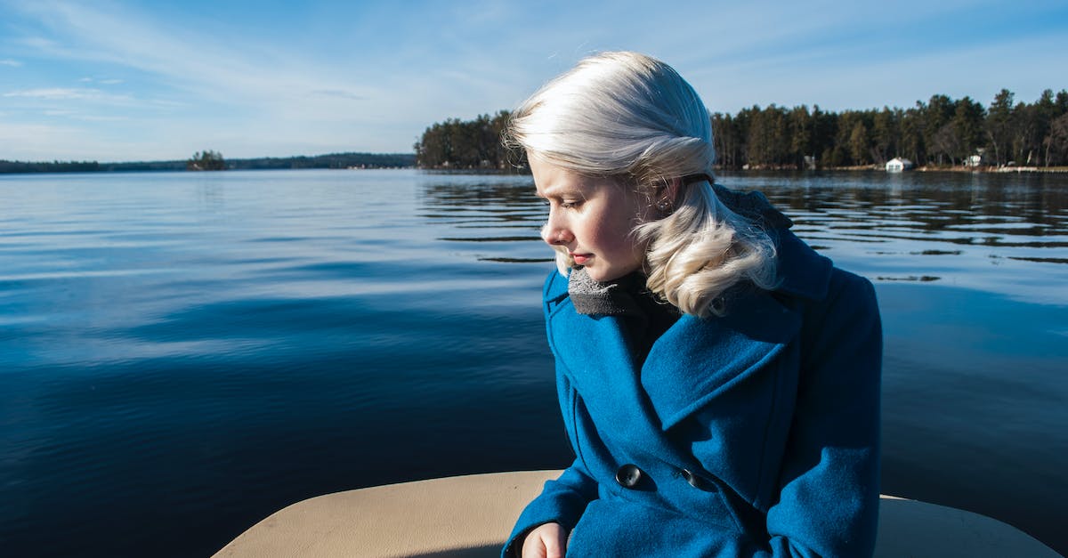 Are there any boat tours for Lake Baikal? - Portrait of a Woman in a Boat