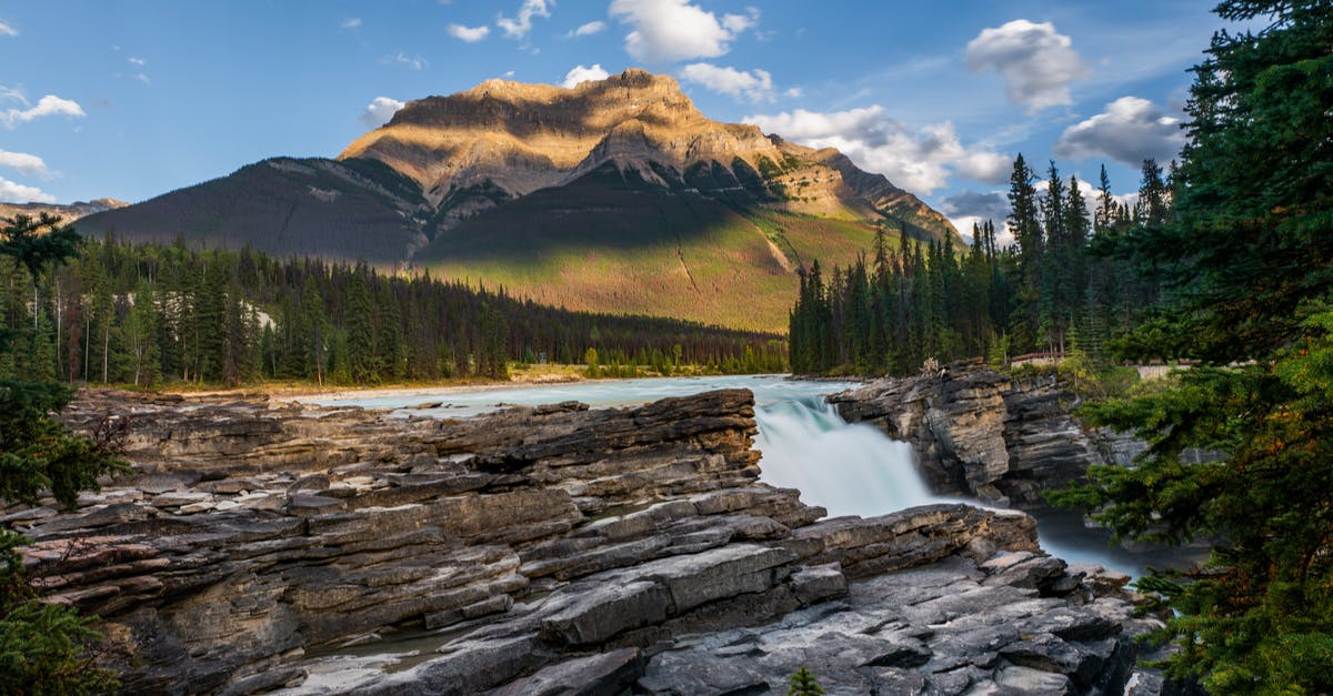 Are there any buses to Rocky Mountain House, Alberta, Canada? - Rocky Cliff on Waterfall