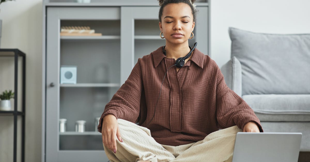 Are there any comprehensive spas ("wellness") in Prague? - Man in Red Sweater Sitting on Couch