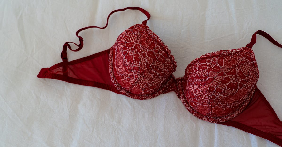 Are there any countries where red clothing is frowned upon? - Red Brassiere on White Textile