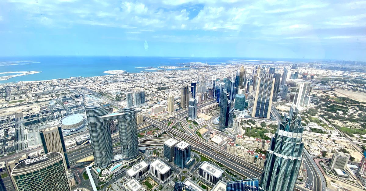 Are there any hostels in Dubai? - Aerial View of City Buildings