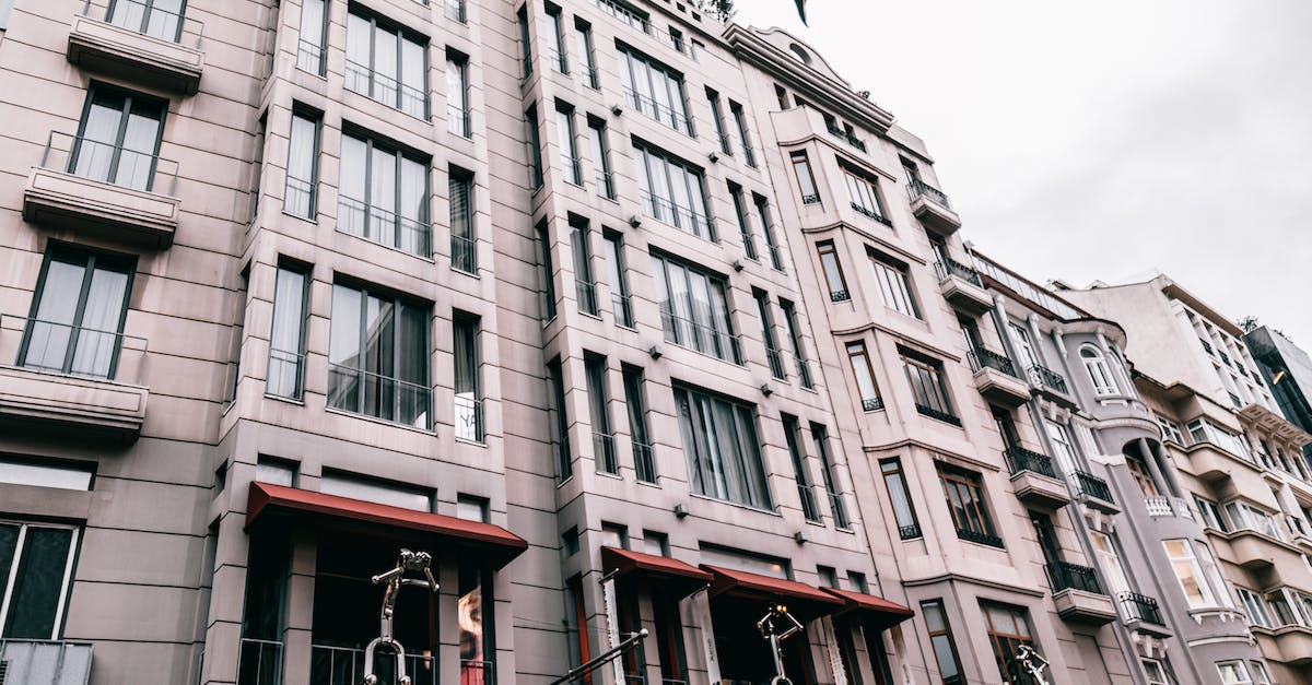 Are there any inhabited condominiums (joint sovereignties) apart from Brčko District? - From below of contemporary residential building decorated with figures located on street of Istanbul