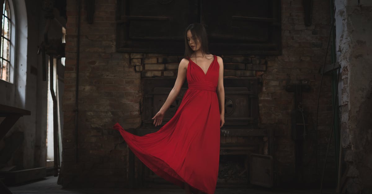 Are there any Japanese castles currently under construction? - Woman in Red Thick Strap Dress