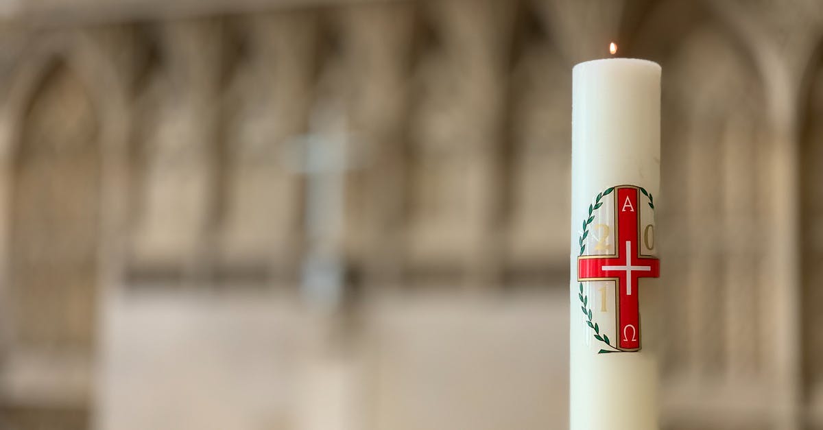 Are there any Taizé worship services in Bergen? - Burning candle with red cross
