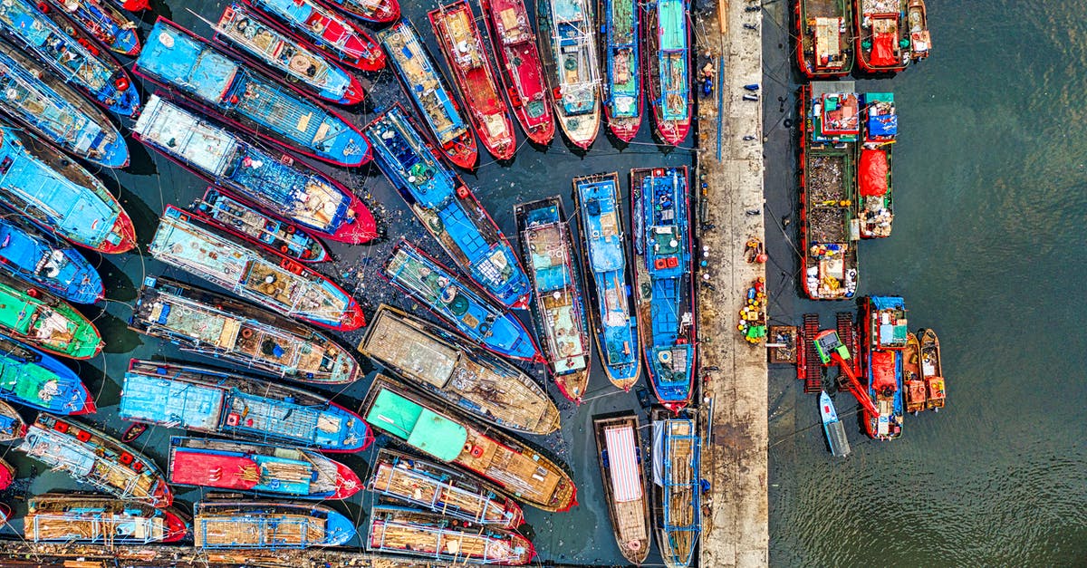 Are there any vessels from French Guiana to Europe? - Aerial View of Cars Parked on Parking Lot