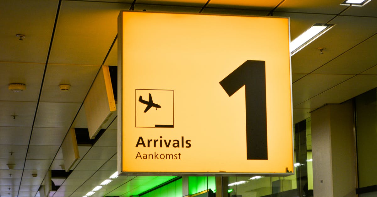 Are there cameras inside toilets in aeroplanes and in airports? [closed] - Arrivals Aankomst Terminal 1 Signage