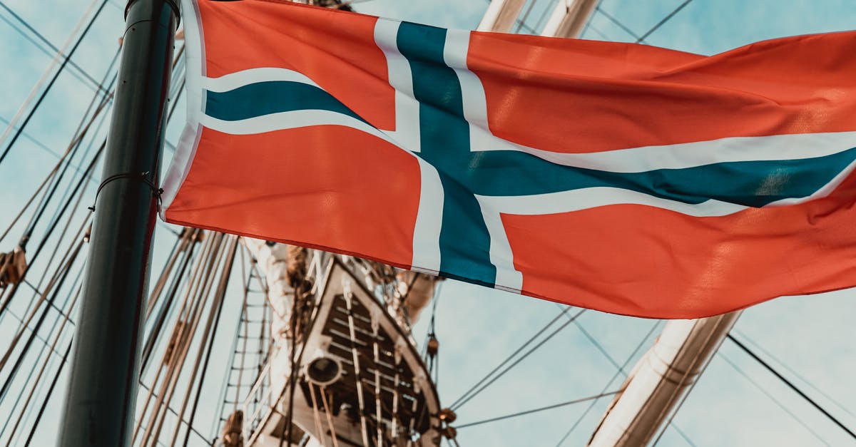 Are there countries that bar nationals from traveling to certain countries? (Outbound travel ban) - National flag of Norway waving on sailboat masthead
