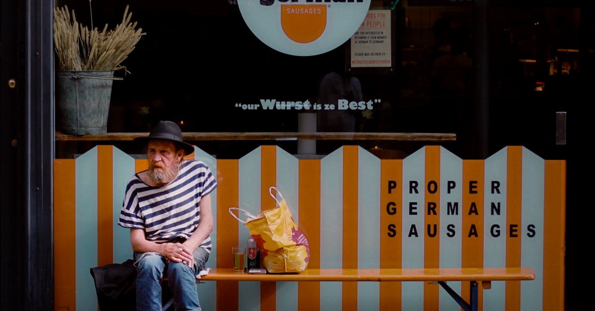 Are there crowd-sourced websites for travel bucket lists? - Man Sits Outside Herman ze German Store