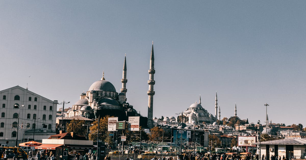 Are there ferries from west coast of Turkey to Greece? - Medieval Hagia Sophia cathedral with dome located on crowded embankment near sea in Istanbul city in Turkey against blue sky