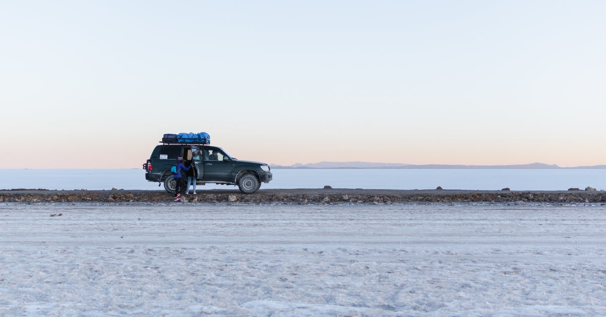 Are there flights from the Salar de Uyuni to Arequipa (Peru)? - Black Suv on Gray Sand