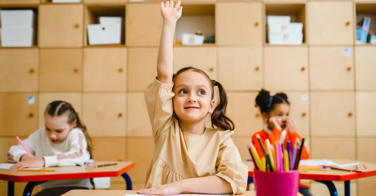 Are there lockers in Gangnam Station? - Girl Raising Hand Inside the Classroom