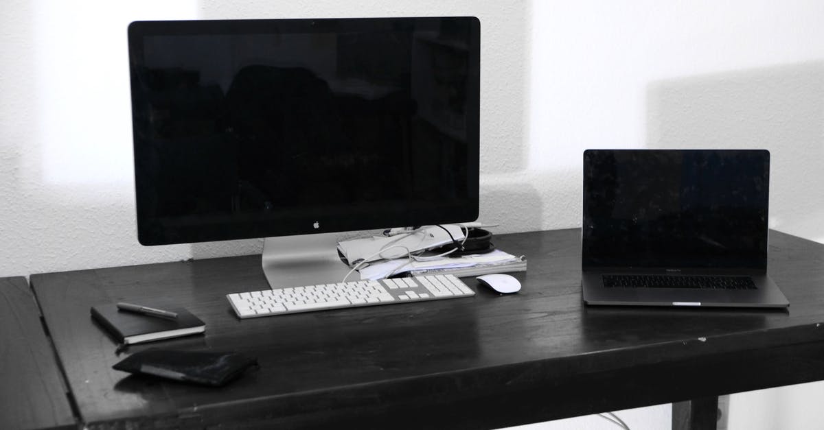 Are there organized surfing day trips from Bordeaux? - Modern computer and laptop on table in room