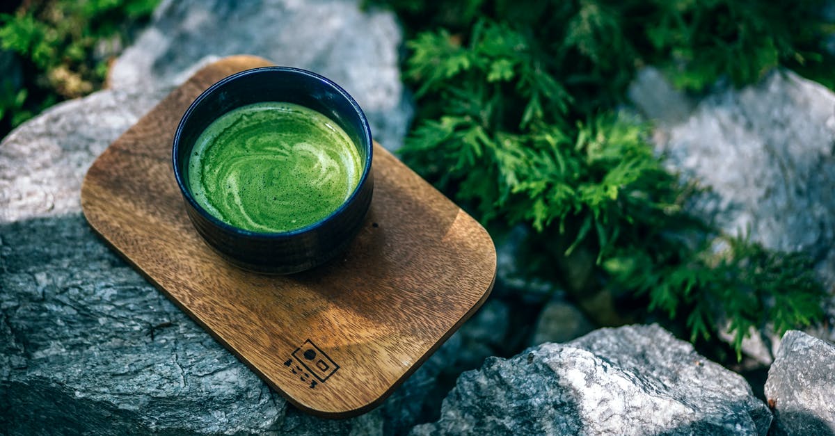 Are there overnight bus from Chiang Mai to Chiang Khong? - Photo of Matcha Drink on a Wooden Tray