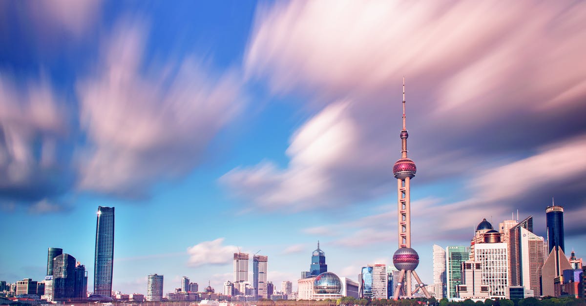 Are there shipping company offices like Shunfeng express in Beijing or Shanghai Pudong Airport? - Long Exposure Photography of Buildings