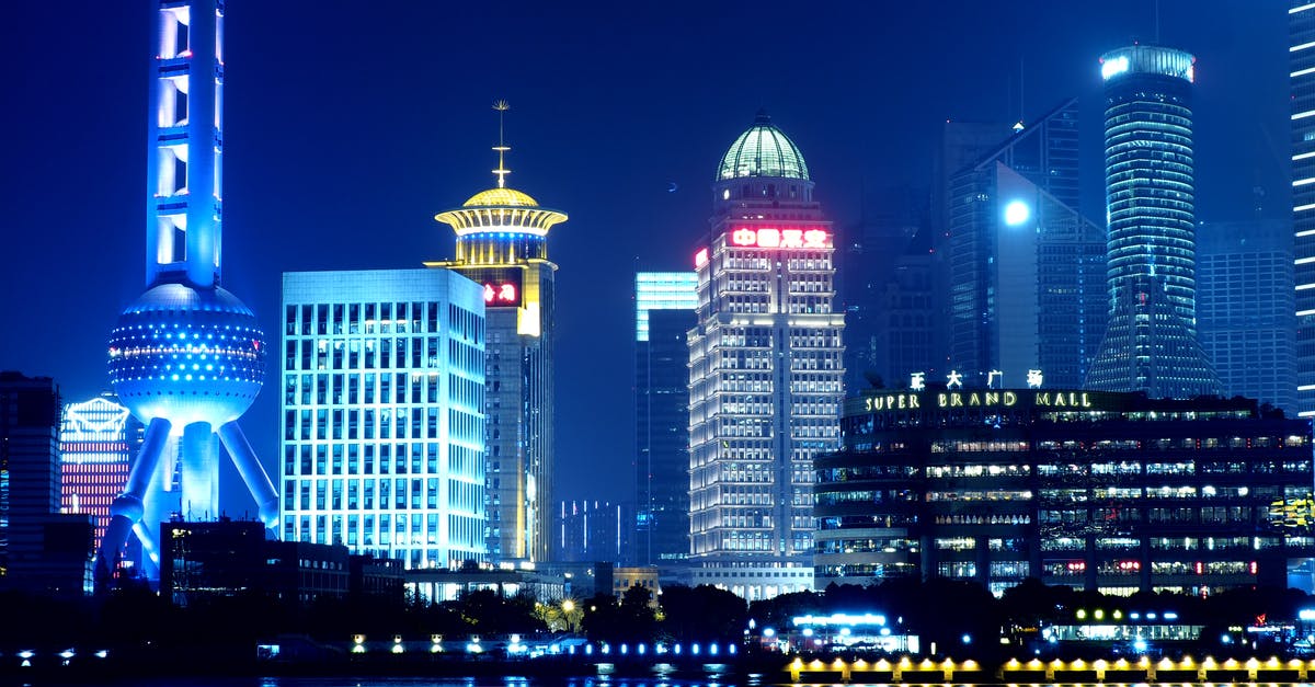 Are there shipping company offices like Shunfeng express in Beijing or Shanghai Pudong Airport? - Oriental Pearl Tower, Shanghai China