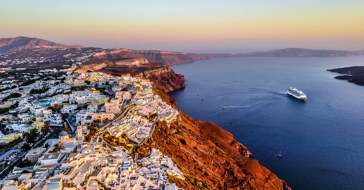 are there shuttles to Canary Island ferry ports - Aerial Photo of White Buildings Near a Bay
