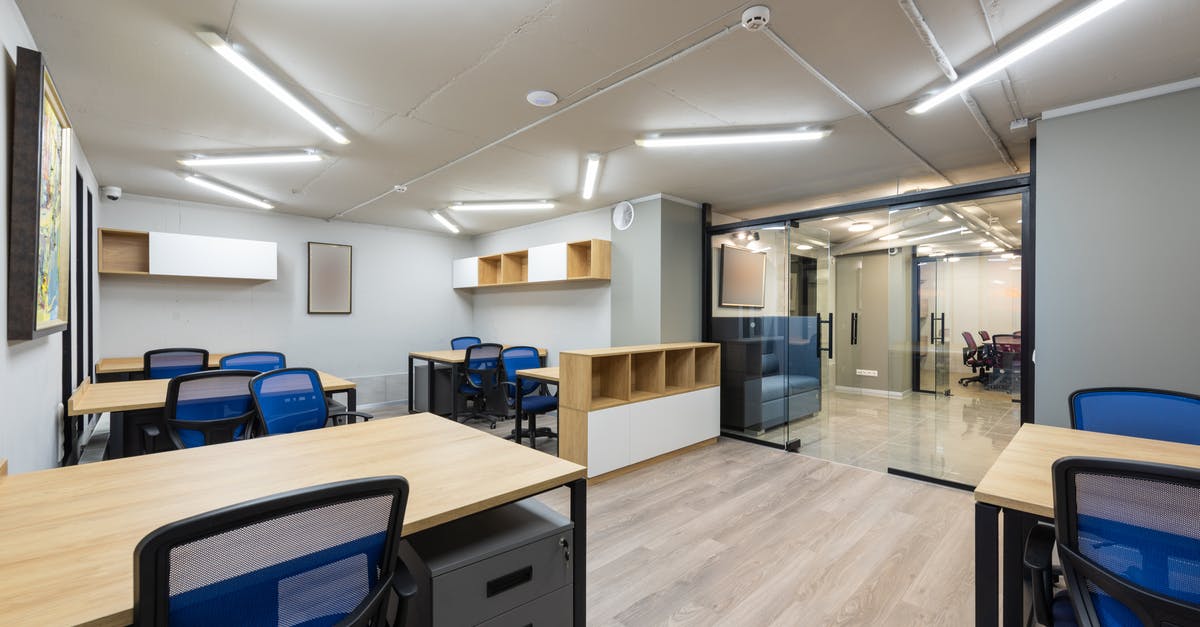 Are there ski/snowboard storage facilities in Whistler? - Contemporary office with glass doors and new furniture