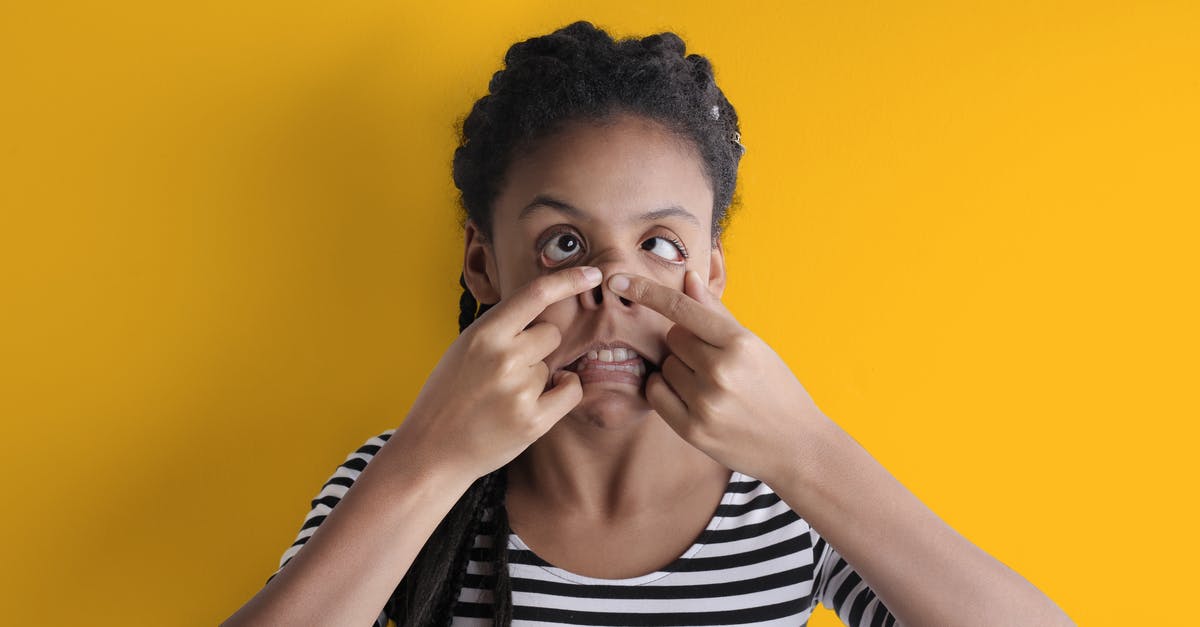 Are women allowed to have dreadlocks in the Maghreb region? - Young funny African American woman grimacing in studio