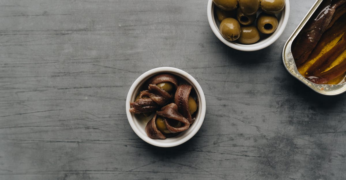 As foreigner, can I get my Bolivian visa in Brazil? - Brown Round Fruits in White Ceramic Bowls