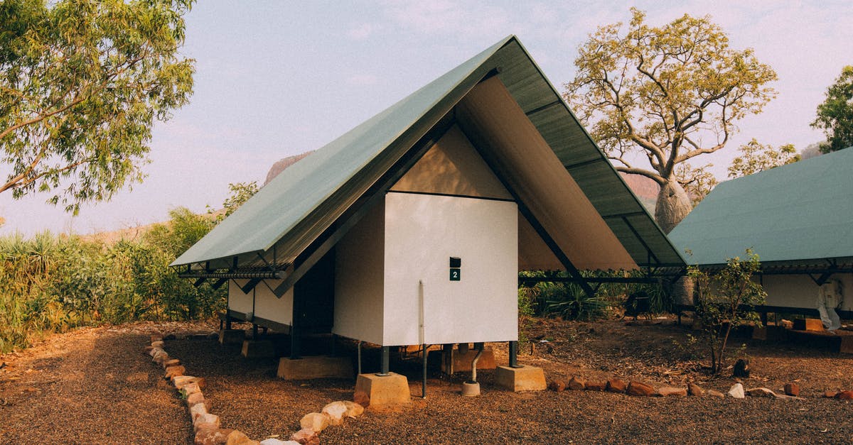 Australia ETA (Evisitor) - White and Gray Wooden House Near Trees