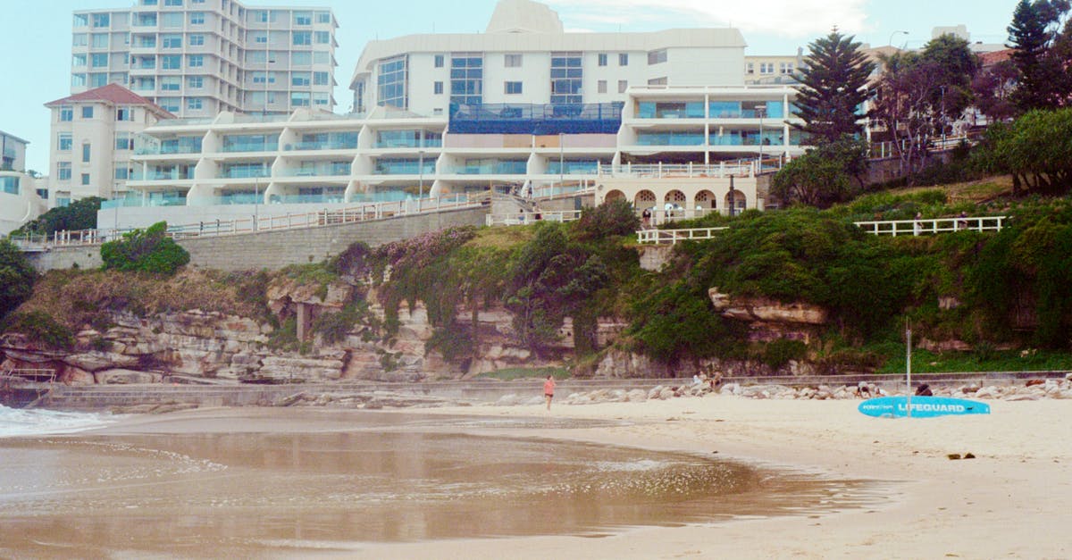 Australia transit visas dates - White Concrete Building Near Body of Water