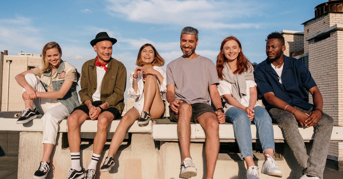 Australian citizen married to UK citizen both living in Australia - Group of People Sitting on Concrete Bench