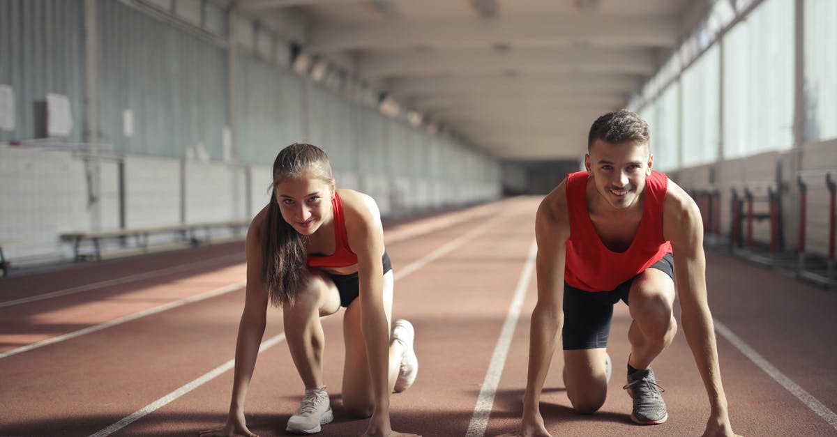 Australian Skilled Visa - Suitable skills assessment [closed] - Men and Woman in Red Tank Top is Ready to Run on Track Field