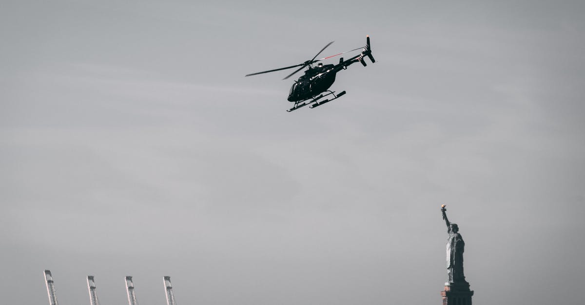 Australians flying to Cuba from the USA [closed] - Photo of a Flying Helicopter Near Statue of Liberty