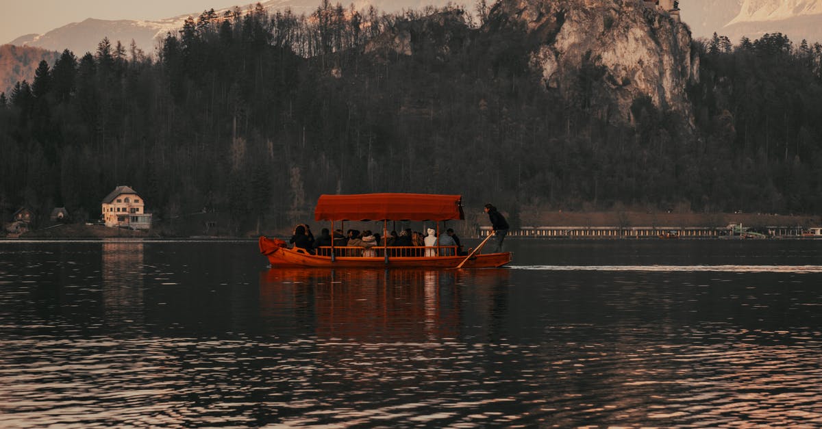 Austria (Villach to Klagenfurt ) to Bled (Slovenia) without tollway - People Riding a Boat on the Lake