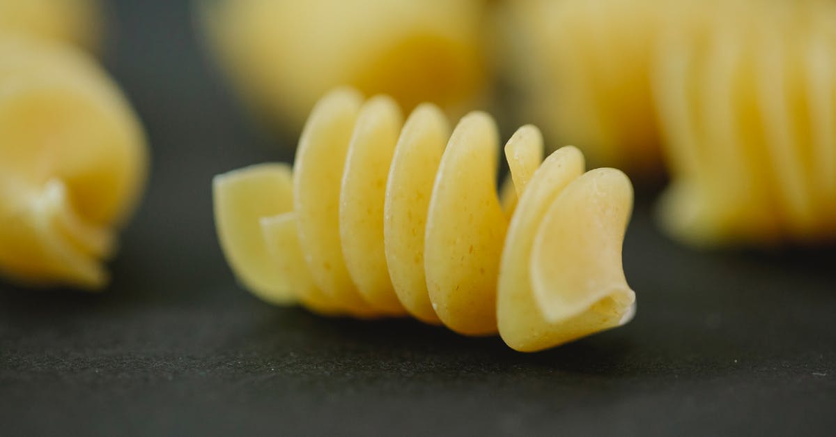 Authentic (non-touristic) places, where Italians eat, in Verona and Venezia [closed] - Closeup of fresh dried yellow fusilli pasta made with traditional Italian dough recipe