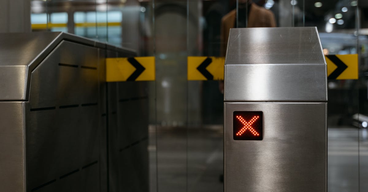 Automatic Visa Re validation (US) - Automatic Entrance Ticket Gate at Subway Entrance with an LED X Sign