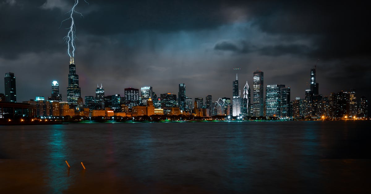 Average processing time for Sweden visa through Chicago - Photo of Chicago Cityscape at Night While Lightning Strikes High Rise Building