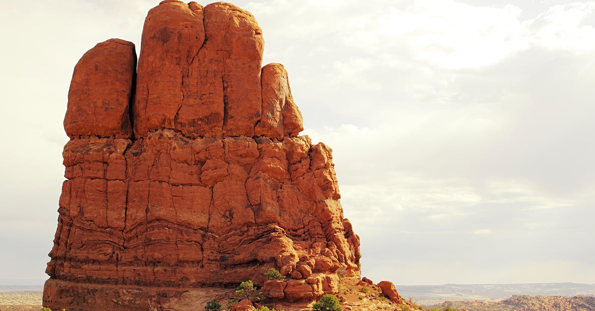 Avoiding crowded times in southern Utah national parks and monuments - Brown Rock Formation Under White Clouds