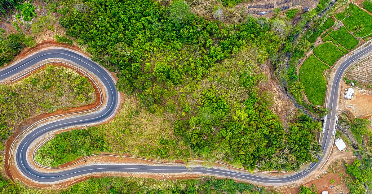 Avoiding red-eye flights for long journeys - A Zigzagging Road In A Mountain