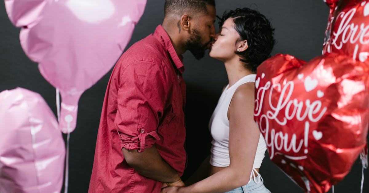 B2 Visa for my Employee/Partner - Couple Kissing Each Other