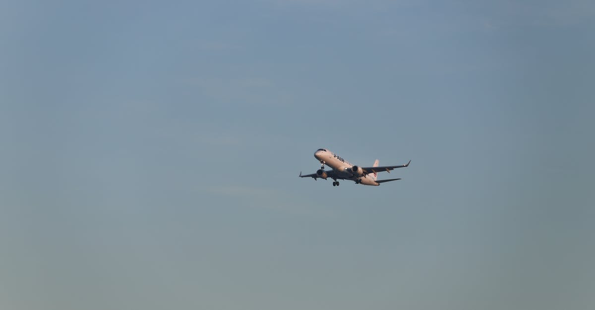 BA 185, what airplane configuration is this? - White and Black Airplane Flying in the Sky